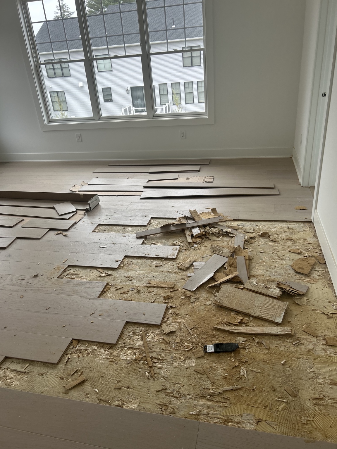 Engineered hardwood glue-down repair: Removing damaged flooring